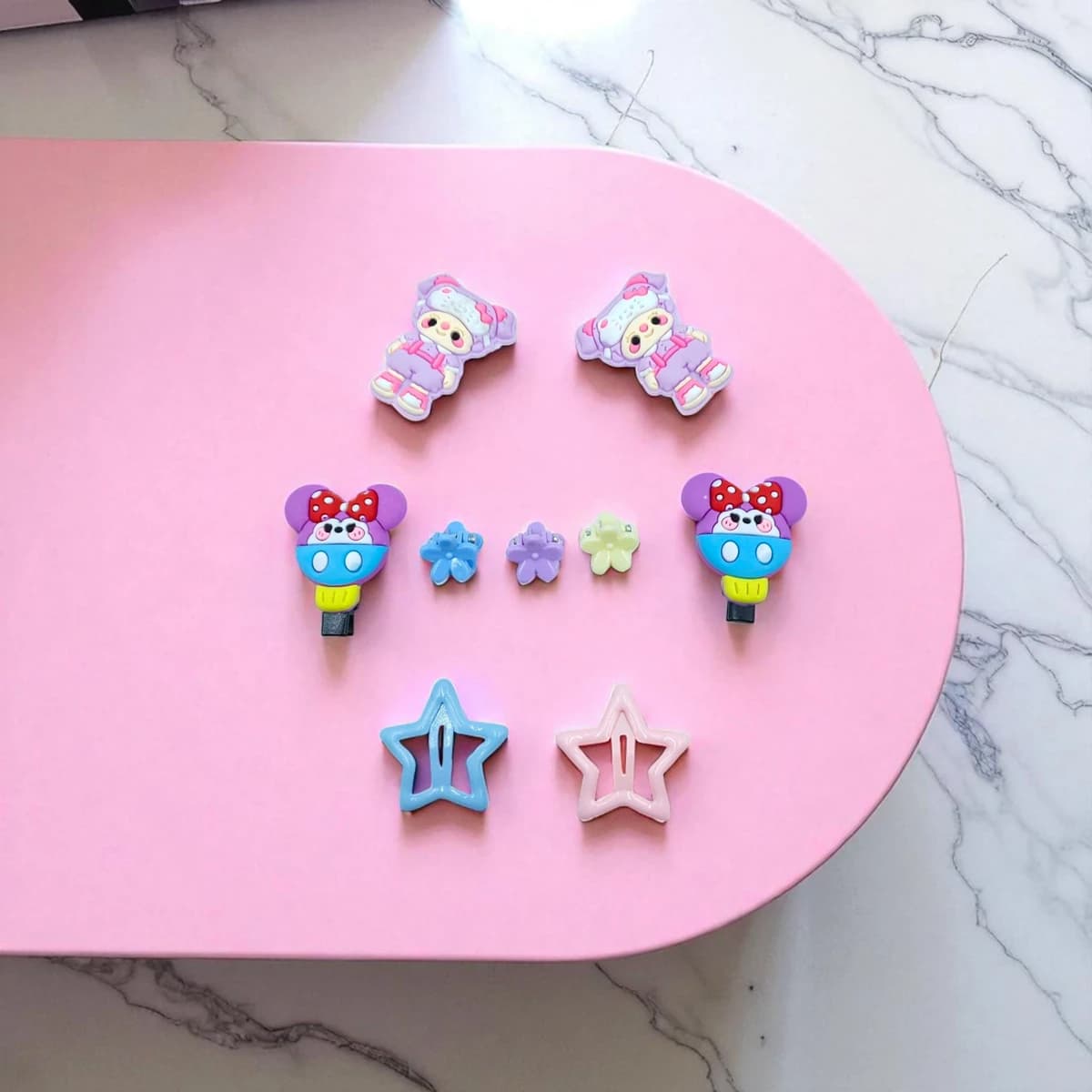 Colorful cartoon-themed hair clip set for kids featuring flowers, stars, and playful characters—perfect for school, parties, and everyday styling with lightweight, safe materials designed for all-day wear.